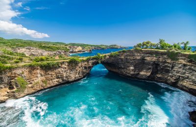 Panoramic view of broken beach in Nusa Penida, Bali, Indonesia. Blue Sky, Turquoise Water.